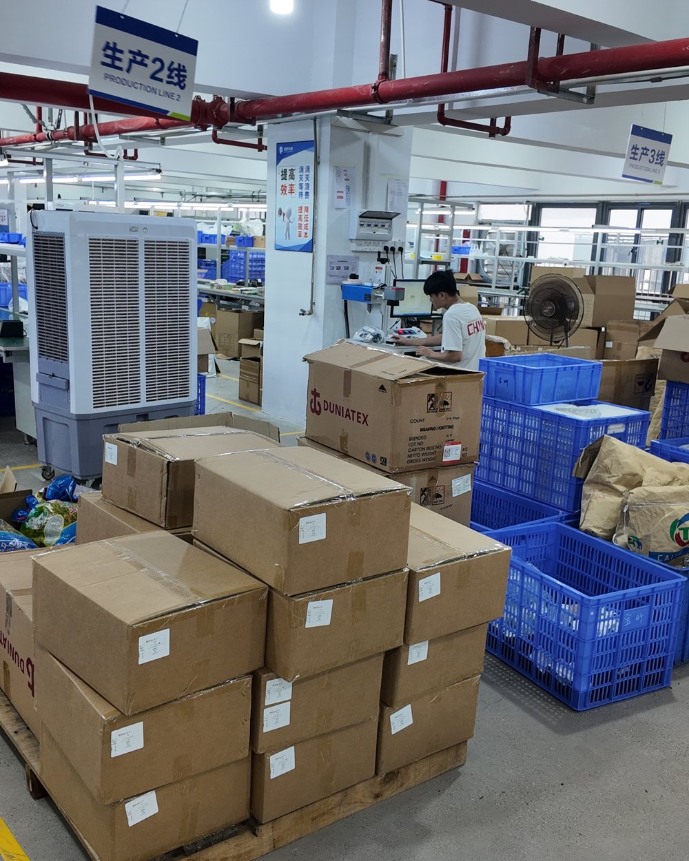 Cartons of finished parts staged in the warehouse