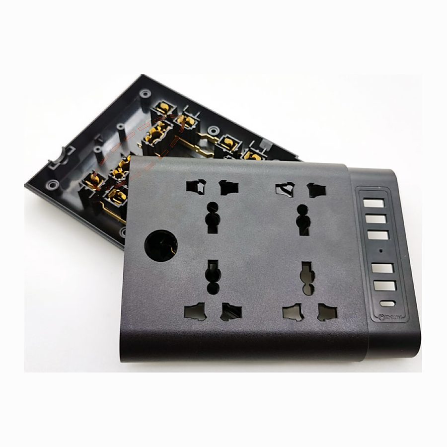 Back of a socket body showing the brass contact assembly inside