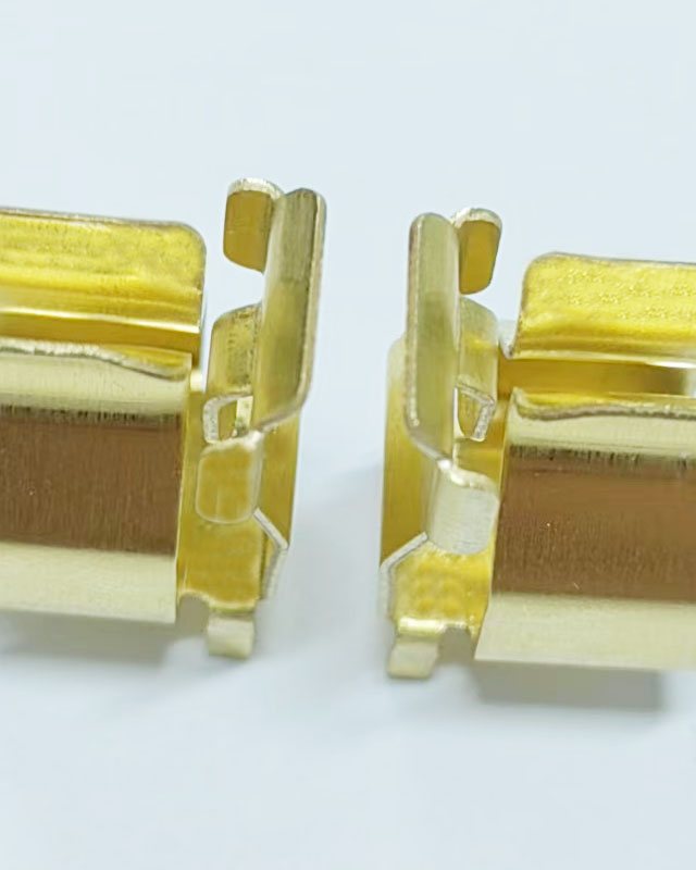 Formed brass contact clips after the secondary forming operation