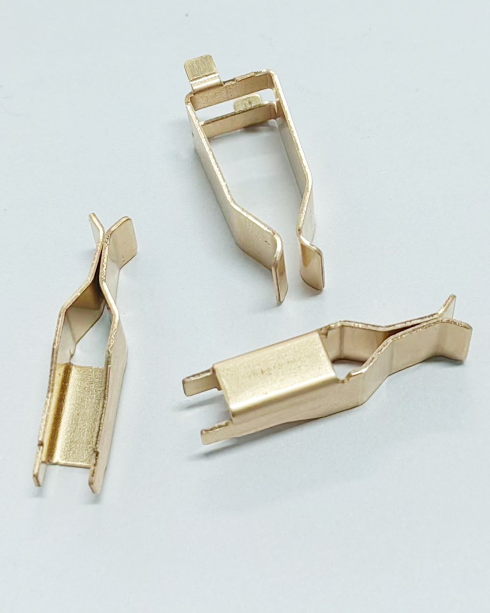 Brass socket contact clips that grip the plug pins