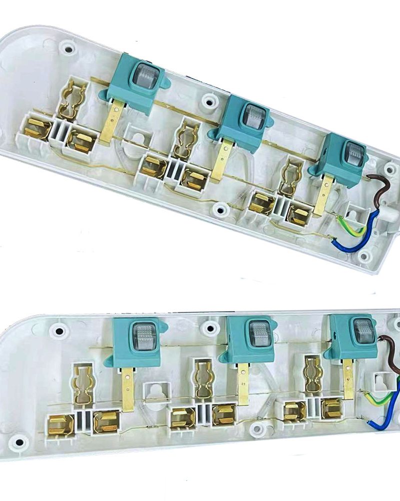 Brass contact strips and busbars fitted inside a power strip housing